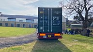 Two One Trip Green Tri Door Shipping Containers Being Delivered 