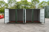 Multistore container unit front with four cargo doors open, painted green