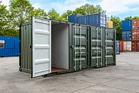 Multistore container unit with one cargo door open, painted green