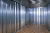 Flat Pack storage container interior, galvanised steel finish