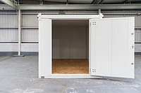 Flat Pack insulated store front, door open, off-white finish