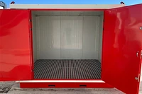 Flat Pack insulated chemical store front, doors open, off-white and red finish