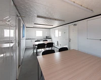 32ft canteen interior with kitchenette, tables and chairs