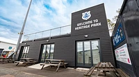 Bishop Auckland FC fan zone with bi-fold glass doors, roof platform, electrics and lighting