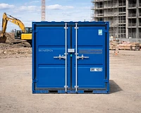 6ft shipping container in a construction setting