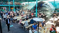 STACK Seaburn food hall with a stage and customers on benches