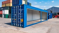 40ft shipping container with dual roller shutter doors open down the long side