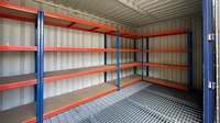 20ft chemical store interior with racking on each wall