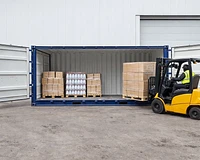 20ft side opening shipping container being loaded by a forklift