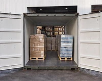 20ft tunnel shipping container filled with stock on pallets