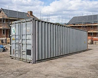 30ft shipping container in a construction setting