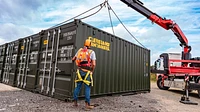 Delivery of a 20ft shipping container to a self storage site using a HIAB truck