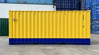 Shipping container side painted in yellow and blue