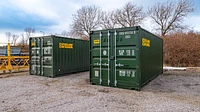 Two 20ft Shipping Containers on a Construction Site