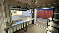 Interior View of Small Shipping Container Bar