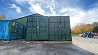 Two shipping containers next to each other for storage