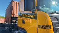 Cleveland Containers truck transporting a container