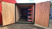 Workshop container doors open