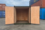 Insulated container with ply lining