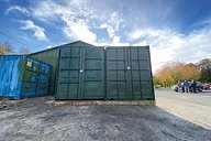 Two shipping containers next to each other for storage