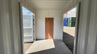 This project involved separating the container into two equal sections by installing a timber partition and internal door.
