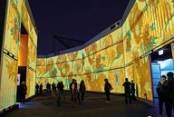 Van Gogh Sunflowers projected onto containers