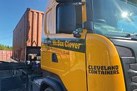Cleveland Containers truck transporting a container